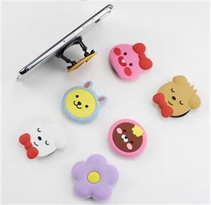 Mobilo tālruņu piederumi Silikona PVC Cute Cartoon mobilā turētāja tālruņa ligzda